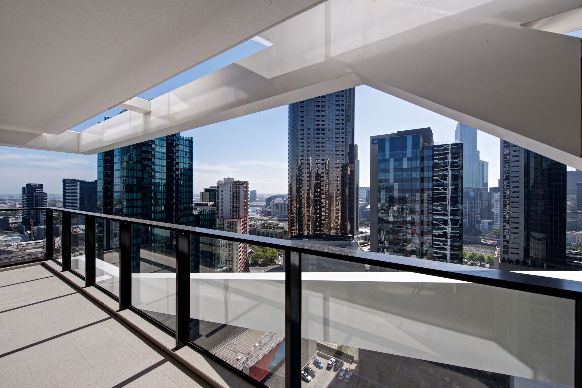City view from an apartment balcony