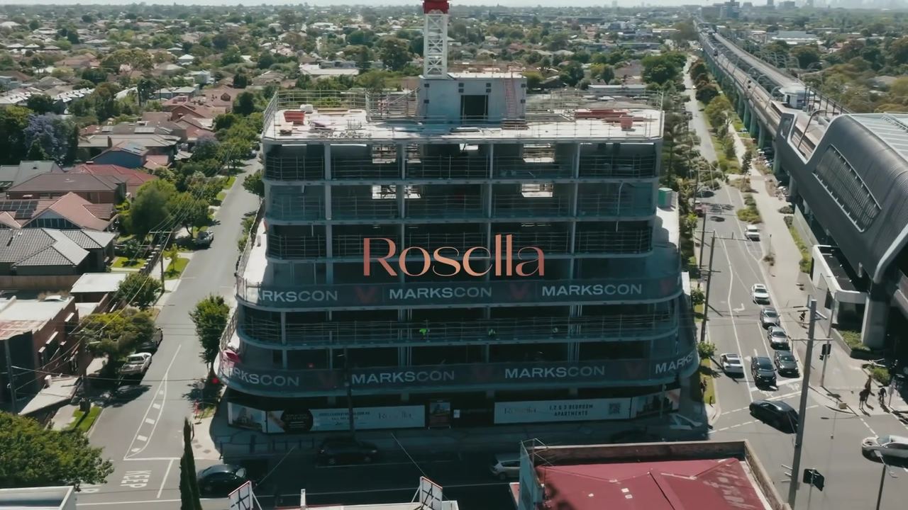 Rosella, Murrumbeena — aerial view during construction with Rosella signage