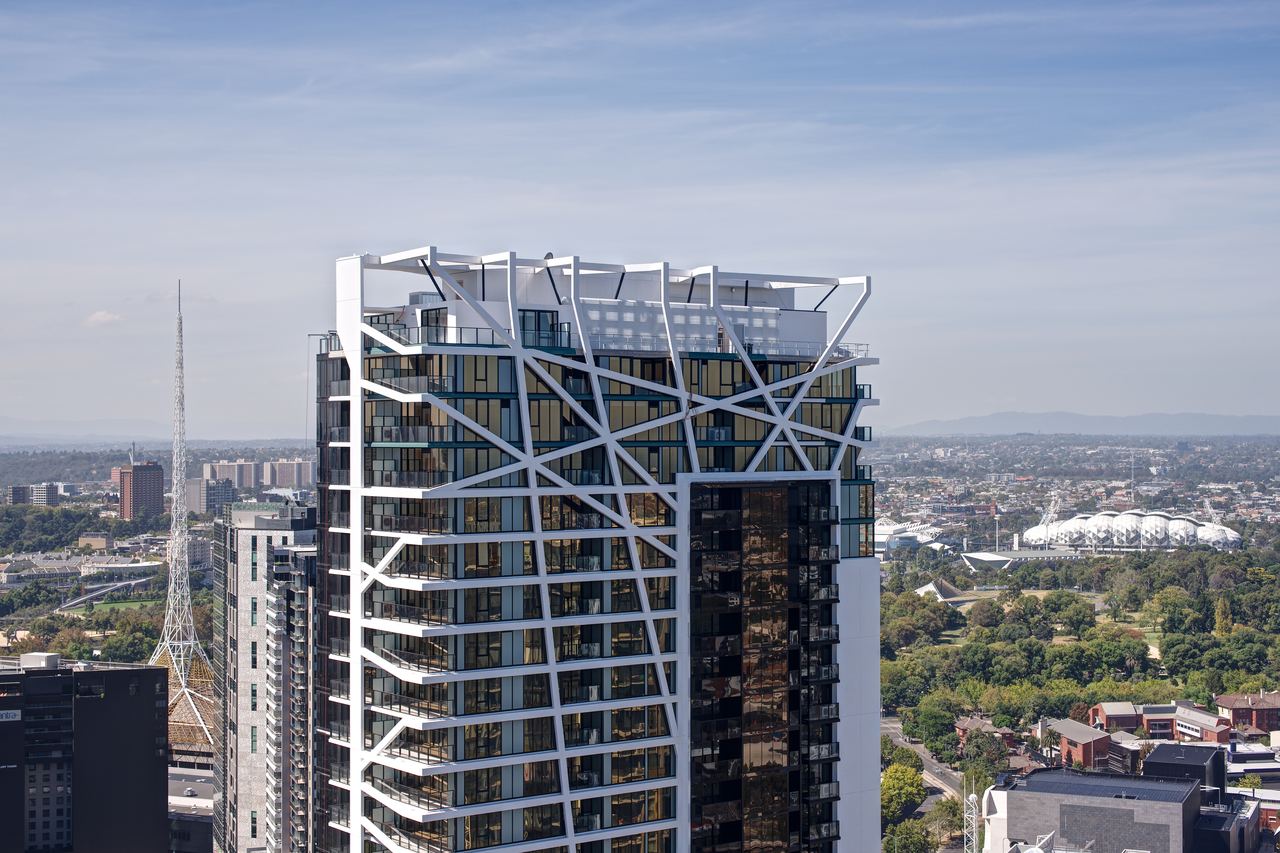 WRAP Residences, Southbank — white lattice crown above the Melbourne skyline